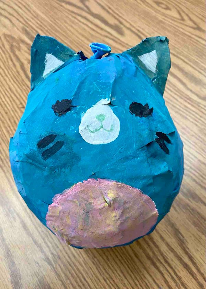 A paper mache cat.